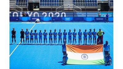 The Indian women’s Hockey team lines up to sing their national anthem during Tokyo 2020 Olympics Bronze medal match against Great Britain at Oi Hockey Stadium in Tokyo on August 6. From a bottom-place finish at Rio 2016, the Indian women's team capped a remarkable journey at Tokyo Olympics, finishing a creditable fourth. This was also a historic moment as the Indian women’s team entered the semi-finals of the Olympics for the first time. (Hamad I Mohammed / REUTERS) The Indian women’s Hockey team lines up to sing their national anthem during Tokyo 2020 Olympics Bronze medal match against Great Britain at Oi Hockey Stadium in Tokyo on August 6. From a bottom-place finish at Rio 2016, the Indian women's team capped a remarkable journey at Tokyo Olympics, finishing a creditable fourth. This was also a historic moment as the Indian women’s team entered the semi-finals of the Olympics for the first time. (Hamad I Mohammed / REUTERS)