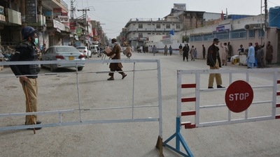 Policemen stand guard on a blocked street in Quetta (AFP/Representative Photo)
