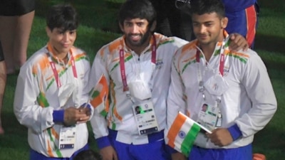 Tokyo: Indian wrestlers Bajrang Punia (C) and Deepak Punia (R) with others at the Olympics Stadium during the closing ceremony of the Summer Olympics 2020, in Tokyo, Sunday, Aug. 8, 2021. (PTI Photo/Gurinder Osan) (PTI08_08_2021_000122B) (PTI)