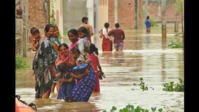 The rising waters of Ganga entered the Maruti Nagar colony in Varanasi on Sunday. (Rajesh Kumar /HT Photo)