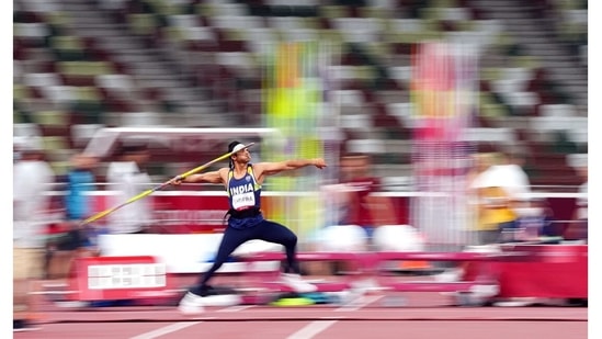 Neeraj Chopra in action during Tokyo 2020 Olympics Athletics men's Javelin throw Final at Olympic Stadium, on August 7, 2021. Chopra on August 7 threw the javelin to a distance of 87.58m to pick the gold at the Olympics. He began his quest for a medal with a massive throw of 87.03 meters and was leading the pack after the end of the first attempt. He bettered it with the second throw of 87.58m.(Aleksandra Szmigiel / REUTERS)