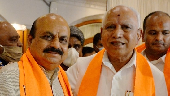 File image of BS Yediyurappa with newly appointed Karnataka chief minister Basavaraj Bommai.(PTI)