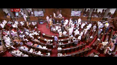 Opposition MPs create uproar in Rajya Sabha during the Monsoon Session of Parliament, in New Delhi on Friday. (ANI)