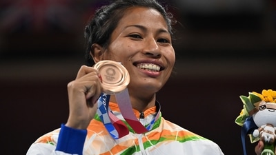 Bronze medallists Lovlina Borgohain of India poses for photos. Pool via REUTERS/Luis Robayo (REUTERS)