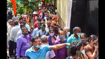 Beneficiaries wait to receive a dose of COVID-19 vaccine during mass vaccination drive organised by Shiv Sena in association with Reliance hospital, in Mumbai, Monday (PTI) Beneficiaries wait to receive a dose of COVID-19 vaccine during mass vaccination drive organised by Shiv Sena in association with Reliance hospital, in Mumbai, Monday (PTI)