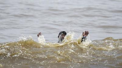 A man swims in the sea to beat the heat, at Dadar Beach in Mumbai. (PTI) A man swims in the sea to beat the heat, at Dadar Beach in Mumbai. (PTI)