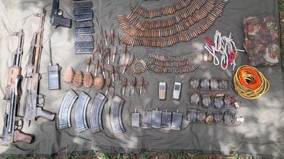 Two AK-47 assault rifles and several Chinese hand grenades were among the arms and ammunitions seized in Jammu and Kashmir on Monday, BSF said. (Photo courtesy-BSF) Two AK-47 assault rifles and several Chinese hand grenades were among the arms and ammunitions seized in Jammu and Kashmir on Monday, BSF said. (Photo courtesy-BSF)