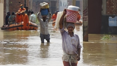 A flood-like situation was witnessed in parts of Uttar Pradesh as heavy rains pounded several districts.(PTI Photo) (PTI)
