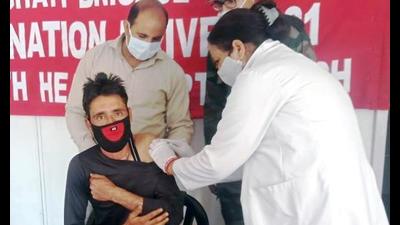 Indian Army organises a COVID-19 vaccination camp at Gulpur village, in Poonch on Monday. (ANI)