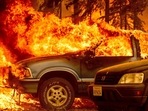 Vehicles engulfed in flames as the Dixie fire rages on in Greenville, California. Vehicles engulfed in flames as the Dixie fire rages on in Greenville, California.