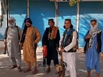 Taliban fighters stand guard in Kunduz city, in northern Afghanistan, on Monday.