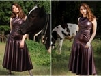 Recently, the actor took to her Instagram handle to share a photo of herself in a metallic dress. In the photo, Tamannaah can be seen posing on a farm with a cow in the picture.