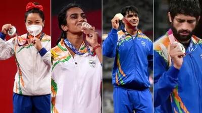 Pride of India: (From left) Mirabai Chanu, PV Sindhu, Neeraj Chopra and Ravi Dahiya. India won seven medals at Tokyo, their best haul at the Olympics. Pride of India: (From left) Mirabai Chanu, PV Sindhu, Neeraj Chopra and Ravi Dahiya. India won seven medals at Tokyo, their best haul at the Olympics.