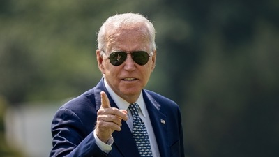 US President Joe Biden walks on the South Lawn of the White House after arriving on Marine One in Washington, D.C. (Bloomberg)