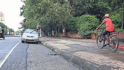 A car parked on the newly constructed cycle track on the Pashan- Sus road on August 3, forces the cyclist to take to the pavement which is meant for pedestrians. More space is not answer to Pune’s parking problems. (KALPESH NUKTE/HT) A car parked on the newly constructed cycle track on the Pashan- Sus road on August 3, forces the cyclist to take to the pavement which is meant for pedestrians. More space is not answer to Pune’s parking problems. (KALPESH NUKTE/HT)
