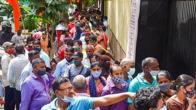 Beneficiaries wait for their dose of Covid-19 vaccine in Mumbai on Monday, August 9. (PTI)