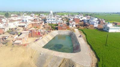 The pond in Peroshah village of Harigobindpur block of Gurdaspur which has turned into a valuable source of irrigation after the liquid waste management project initiated in September 2019. (HT PHOTO)