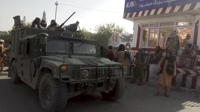 Taliban fighters stand guard at a checkpoint in Kunduz city, northern Afghanistan. (AP) Taliban fighters stand guard at a checkpoint in Kunduz city, northern Afghanistan. (AP)