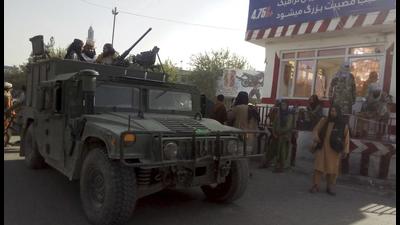 Taliban fighters stand guard at a checkpoint in Kunduz city, northern Afghanistan. (AP) Taliban fighters stand guard at a checkpoint in Kunduz city, northern Afghanistan. (AP)