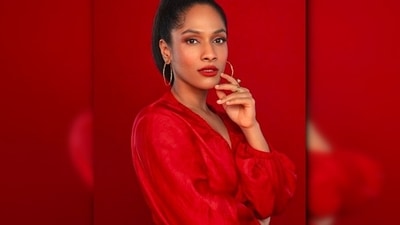 In another, she posed in a bright red wrap top. With blushed cheek and lips, Masaba accessorised her look with hoop earrings. (Instagram/@masabagupta) In another, she posed in a bright red wrap top. With blushed cheek and lips, Masaba accessorised her look with hoop earrings. (Instagram/@masabagupta)
