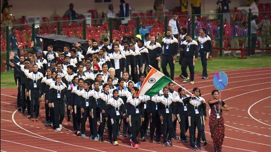 The Indian contingent marching past during the opening ceremony of the 22nd Asian Athletic Championships at the Kalinga Stadium in Bhubaneshwar in 2017. (PTI) The Indian contingent marching past during the opening ceremony of the 22nd Asian Athletic Championships at the Kalinga Stadium in Bhubaneshwar in 2017. (PTI)