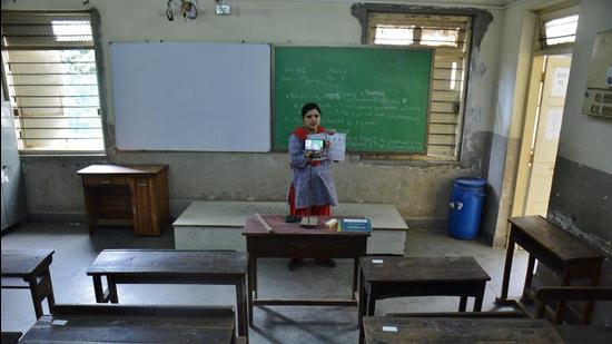 A teacher conducts online studies at People's Education Society School and College in June. (HT PHOTO)