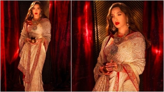 Nora Fatehi is the epitome of royalty in this sequined saree by designer Anjul Bhandari.(Instagram/@norafatehi)