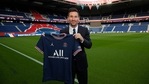 Lionel Messi poses with the Paris Saint-Germain jersey after signing a 2 year contract at Parc des Princes. (Getty Images) Lionel Messi poses with the Paris Saint-Germain jersey after signing a 2 year contract at Parc des Princes. (Getty Images)