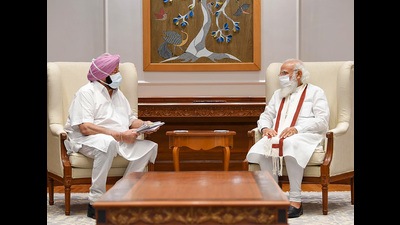 Prime Minister Narendra Modi with Punjab Chief Minister Capt. Amarinder Singh during their meeting in New Delhi on Wednesday. (PTI) Prime Minister Narendra Modi with Punjab Chief Minister Capt. Amarinder Singh during their meeting in New Delhi on Wednesday. (PTI)