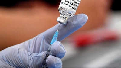 Latest data from Public Health England (PHE) and Cambridge University also shows that around 60,000 deaths, 22 million infections and 66,900 hospitalisations have been prevented by Covid vaccines. (AFP) Latest data from Public Health England (PHE) and Cambridge University also shows that around 60,000 deaths, 22 million infections and 66,900 hospitalisations have been prevented by Covid vaccines. (AFP)