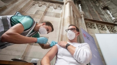 A man gets a vaccine at the vaccination center (Representational) (AFP) A man gets a vaccine at the vaccination center (Representational) (AFP)