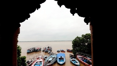 Boats anchored along the banks of the Ganga river at Assi Ghat, as the water level rises following monsoon rain in Varanasi, resulting in floods in several areas. (PTI) Boats anchored along the banks of the Ganga river at Assi Ghat, as the water level rises following monsoon rain in Varanasi, resulting in floods in several areas. (PTI)