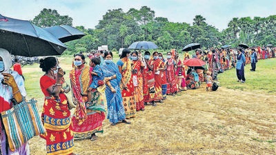 Beneficiaries wait in a queue for their Covid-19 vaccine dose in Birbhum district of West Bengal on Tuesday, August 10. (PTI) Beneficiaries wait in a queue for their Covid-19 vaccine dose in Birbhum district of West Bengal on Tuesday, August 10. (PTI)