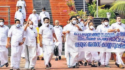 Opposition MLAs stage a protest outside Kerala Legislative complex over the gold smuggling case on January 8. (PTI) Opposition MLAs stage a protest outside Kerala Legislative complex over the gold smuggling case on January 8. (PTI)