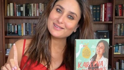 Kareena Kapoor poses with her book, Kareena Kapoor Khan's Pregnancy Bible. Kareena Kapoor poses with her book, Kareena Kapoor Khan's Pregnancy Bible.