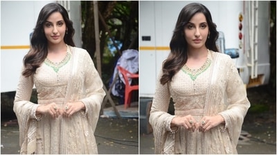 To accessorise the traditional outfit, Nora chose a heavy necklace adorned with white and green stones. She rounded it off with matching rings and earrings. Her open luscious tresses were styled in soft waves. (Varinder Chawla) To accessorise the traditional outfit, Nora chose a heavy necklace adorned with white and green stones. She rounded it off with matching rings and earrings. Her open luscious tresses were styled in soft waves. (Varinder Chawla)