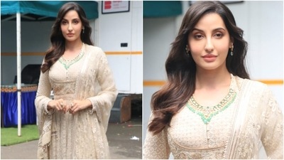 Nora Fatehi was snapped today on the sets of The Kapil Sharma Show with the team of the upcoming war drama Bhuj: The Pride of India. The film also stars Ajay Devgn, Sanjay Dutt, Sonakshi Sinha, and Sharad Kelkar. (Varinder Chawla) Nora Fatehi was snapped today on the sets of The Kapil Sharma Show with the team of the upcoming war drama Bhuj: The Pride of India. The film also stars Ajay Devgn, Sanjay Dutt, Sonakshi Sinha, and Sharad Kelkar. (Varinder Chawla)