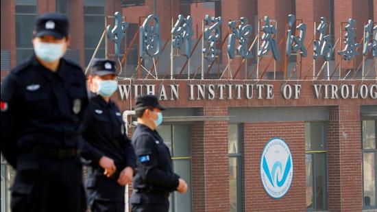 In this file photo, security personnel keep watch outside the Wuhan Institute of Virology in, Hubei province, China. (REUTERS)