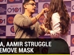 Kiara, Aamir struggle to remove mask