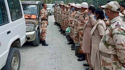 Indo-Tibetan Border Police (ITBP) personnel being given instructions before a rescue operation as a massive landslide occurs at Nigulsari, in Kinnaur, Himachal Pradesh. (ANI) Indo-Tibetan Border Police (ITBP) personnel being given instructions before a rescue operation as a massive landslide occurs at Nigulsari, in Kinnaur, Himachal Pradesh. (ANI)