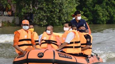 Uttar Pradesh chief minister Yogi Adityanath surveying flood-affected areas in Varanasi by boat on Thursday. (HT Photo) Uttar Pradesh chief minister Yogi Adityanath surveying flood-affected areas in Varanasi by boat on Thursday. (HT Photo)