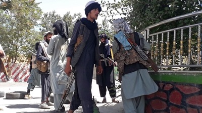 Taliban fighters stand along the roadside in Ghazni as the Taliban move closer to the Afghan capital after taking Ghazni city. (AFP) Taliban fighters stand along the roadside in Ghazni as the Taliban move closer to the Afghan capital after taking Ghazni city. (AFP)