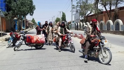 Taliban fighters patrol inside the city of Ghazni, southwest of Kabul, Afghanistan. (AP) Taliban fighters patrol inside the city of Ghazni, southwest of Kabul, Afghanistan. (AP)