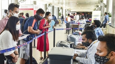 Air travellers get themselves registered for Covid-19 tests, at T-3 terminal of Indira Gandhi International Airport, in New Delhi. (PTI file photo) Air travellers get themselves registered for Covid-19 tests, at T-3 terminal of Indira Gandhi International Airport, in New Delhi. (PTI file photo)
