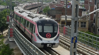 A metro train runs on a track on the Pink Line corridor. (PTI File Photo) A metro train runs on a track on the Pink Line corridor. (PTI File Photo)