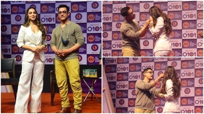 Aamir Khan and Kiara Advani on stage at the event. Aamir Khan and Kiara Advani on stage at the event.
