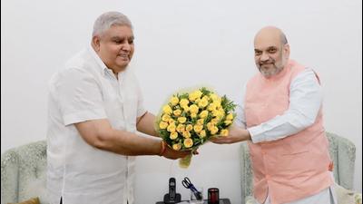 West Bengal governor Jagdeep Dhankhar with Union home minister Amit Shah at the latter’s residence in New Delhi on Thursday. (TWITTER.) West Bengal governor Jagdeep Dhankhar with Union home minister Amit Shah at the latter’s residence in New Delhi on Thursday. (TWITTER.)