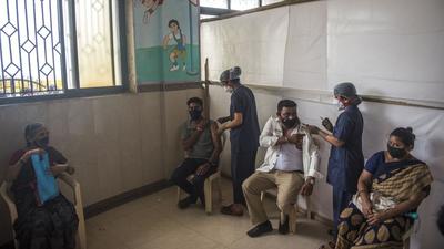 Beneficiaries get inoculated against Covid-19 at a vaccination centre in Worli Seaface, Mumbai on Thursday. (Pratik Chorge/HT PHOTO) Beneficiaries get inoculated against Covid-19 at a vaccination centre in Worli Seaface, Mumbai on Thursday. (Pratik Chorge/HT PHOTO)