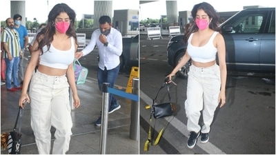 Janhvi completed her attire with black sneakers, cool glasses, a luxurious Off-White bag, and open locks. Her sister also chose a similar all-white look, but she added a street-style twist to it. (Varinder Chawla) Janhvi completed her attire with black sneakers, cool glasses, a luxurious Off-White bag, and open locks. Her sister also chose a similar all-white look, but she added a street-style twist to it. (Varinder Chawla)