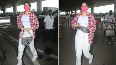 Khushi wore the uber-chic outfit with matching sneakers, a Christian Dior saddlebag, a dainty chain, and a quirky bracelet. She tied her locks in a messy bun and chose to flaunt her natural glow. (Varinder Chawla) Khushi wore the uber-chic outfit with matching sneakers, a Christian Dior saddlebag, a dainty chain, and a quirky bracelet. She tied her locks in a messy bun and chose to flaunt her natural glow. (Varinder Chawla)